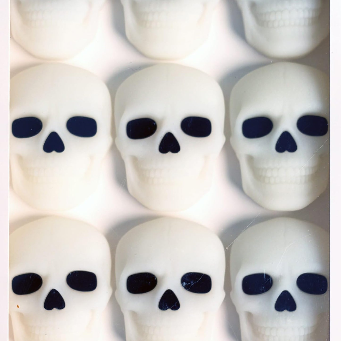 12-Pack Glow-in-the-Dark Skull Knob Covers – Reusable Silicone Design