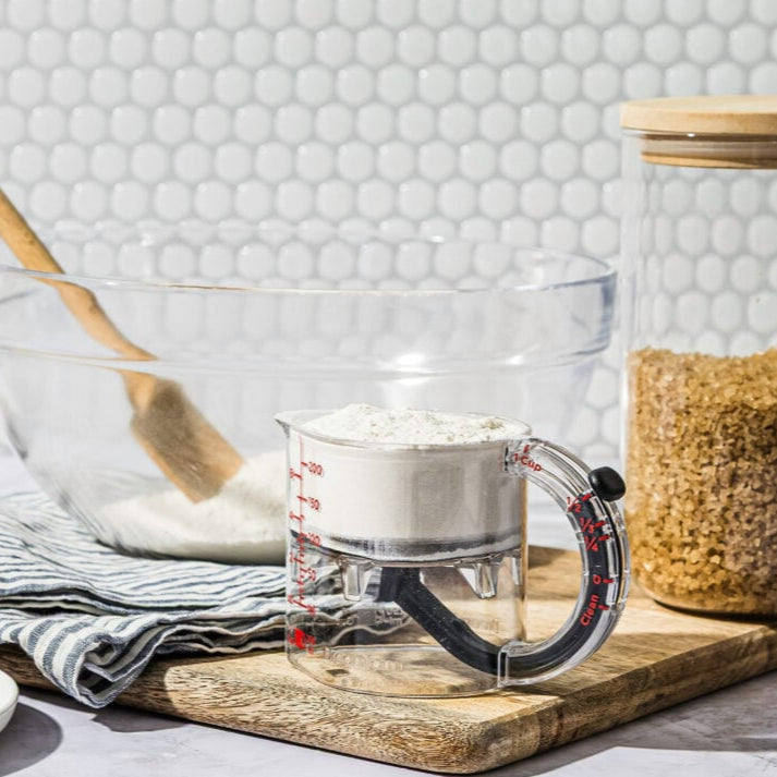 4-in-1 Adjustable Measuring Cup with Built-in Scraper