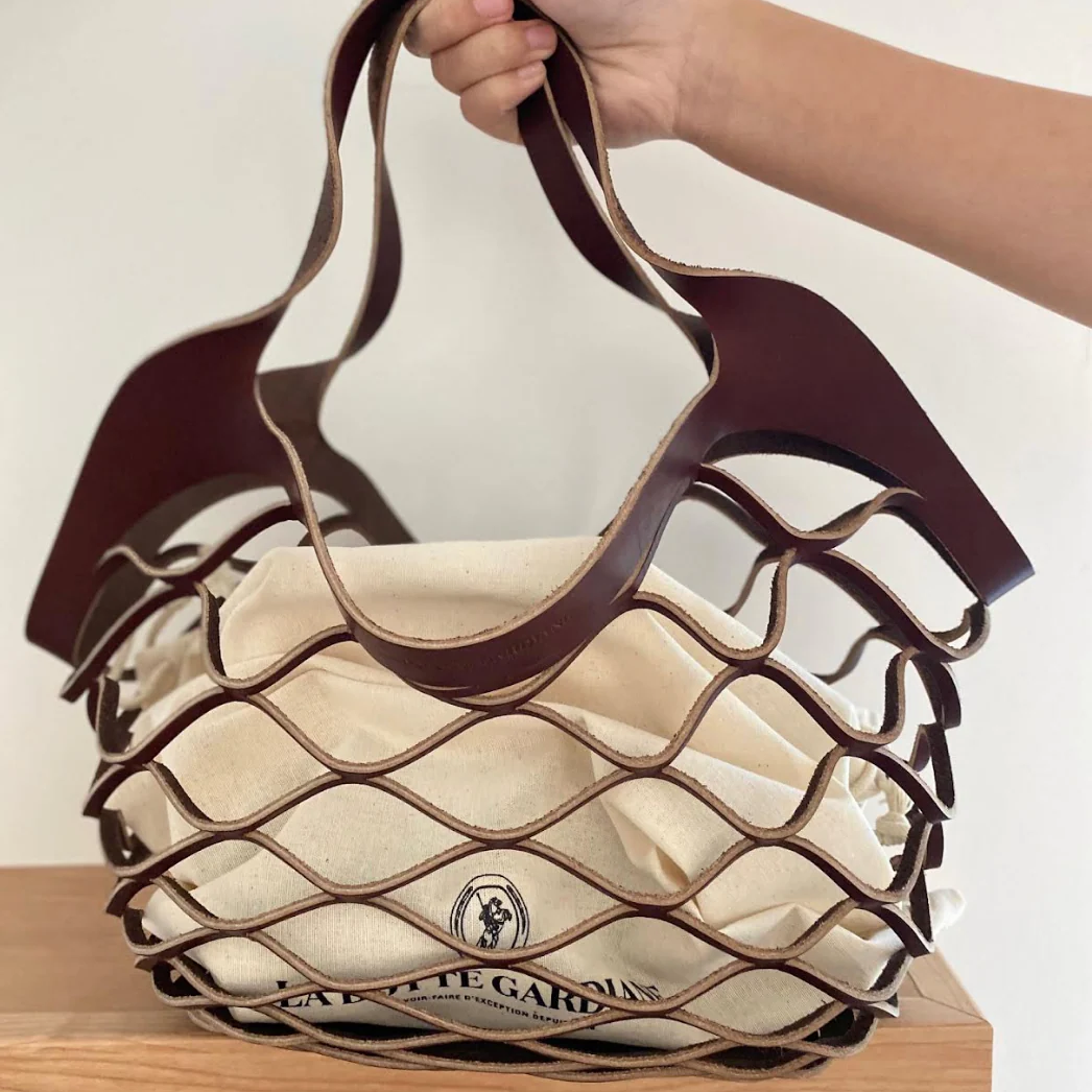Brown Mesh Leather Bag – Chic & Functional Travel Companion